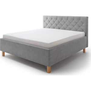 Světle šedá čalouněná dvoulůžková postel s úložným prostorem s roštem 180x200 cm San Remo – Meise Möbel
